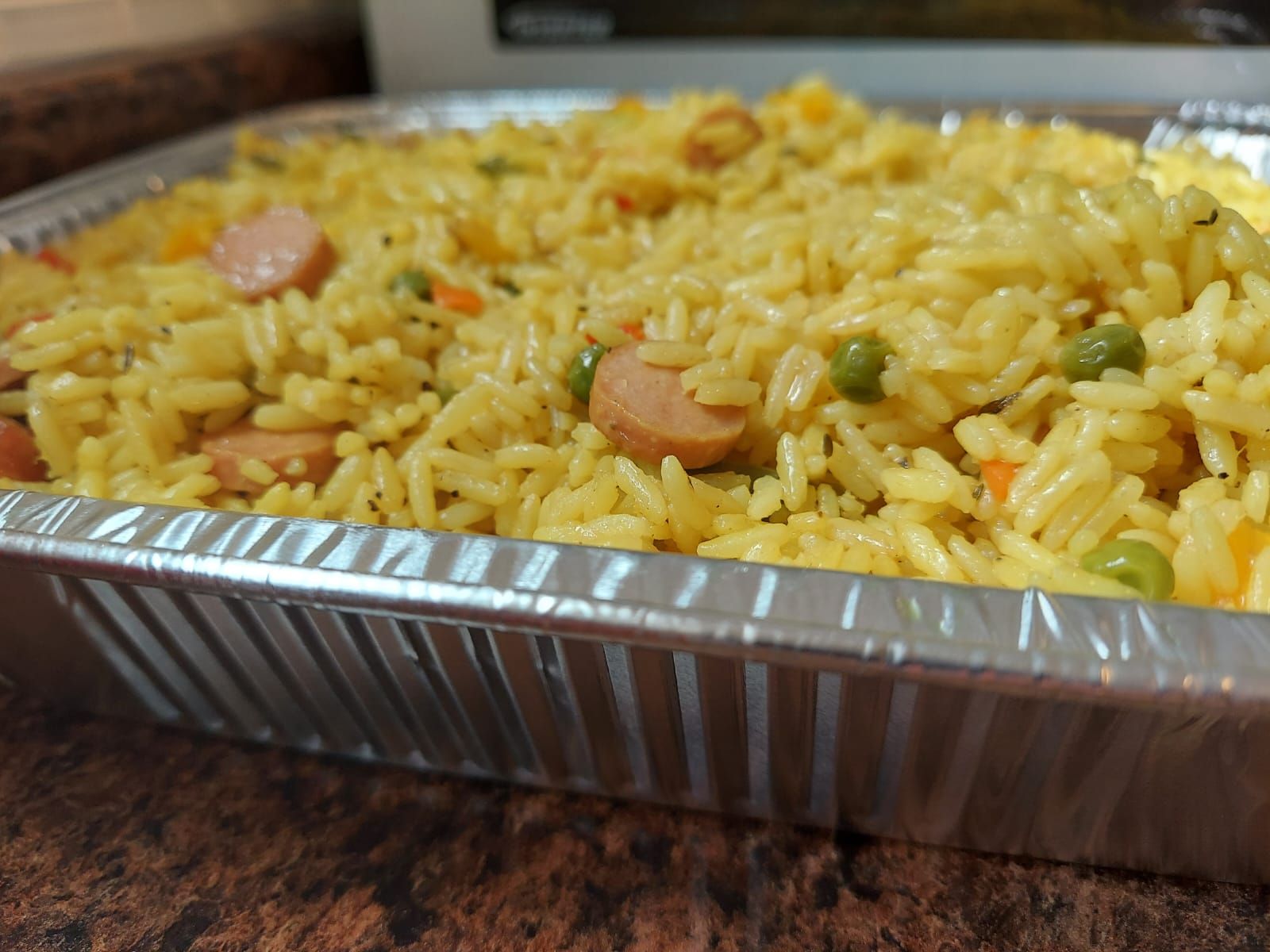 Nigerian fried rice party tray by Metheq Cuisine
