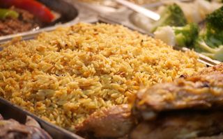Party rice and chicken in Nigerian catering trays